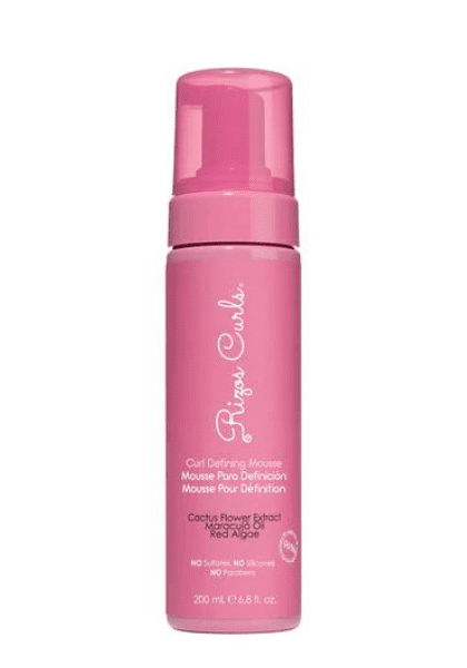 Mousse to enhance curly hair definition and hold.
